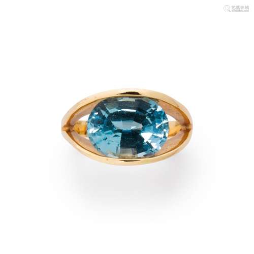 A blue topaz and fourteen karat gold ring