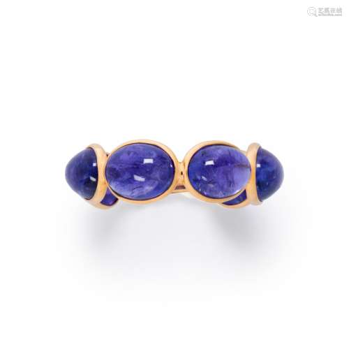 A tanzanite and eighteen karat gold ring