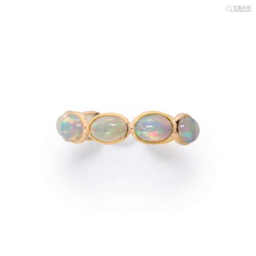 An opal and eighteen karat gold ring