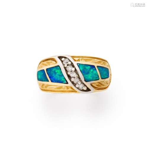 A gemstone and fourteen karat gold ring