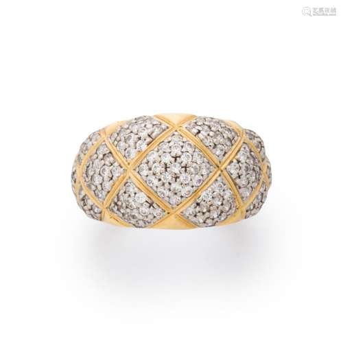 A diamond and fourteen karat bi-color gold ring