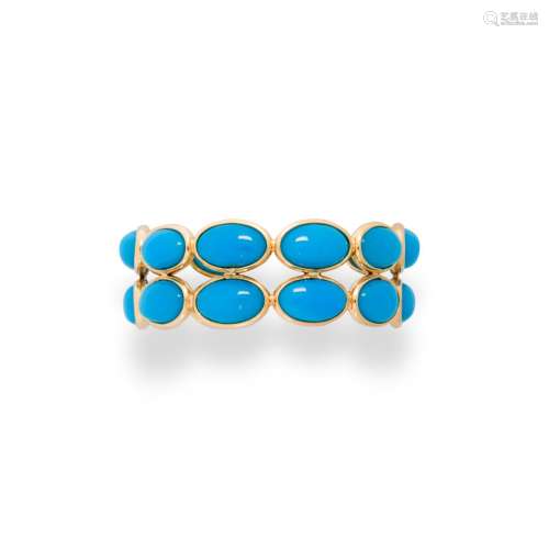 A turquoise and eighteen karat gold ring