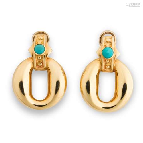 A pair of turquoise, and fourteen karat gold ear clips