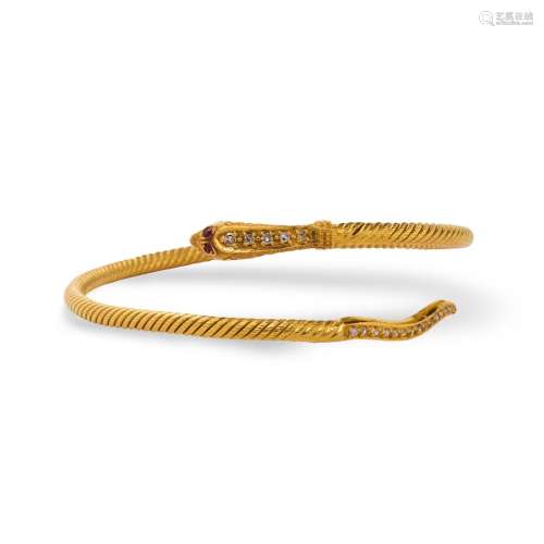 An Egyptian gemstone and twenty-one karat gold bracelet