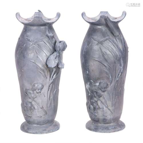 A pair of Continental Art Nouveau pewter vases after a model...