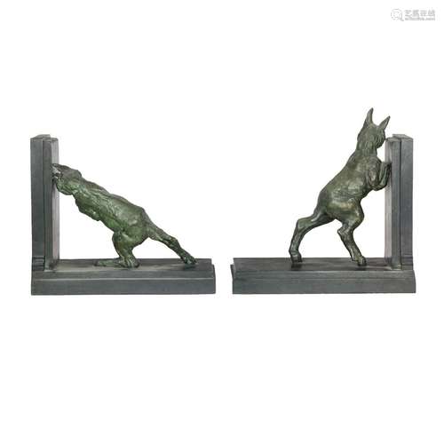 A pair of French patinated metal animalier bookends after a ...