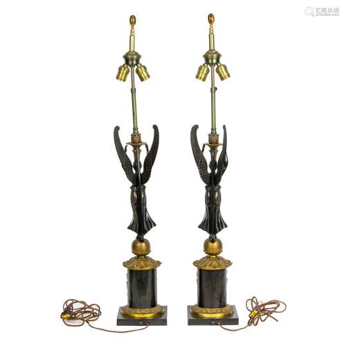 A pair of French Empire gilt and patinated bronze figural ca...