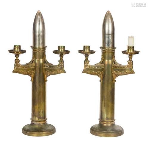 A pair of Swedish Trench Art brass two-light candelabra