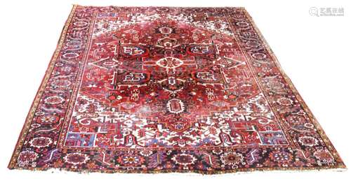 An antique Heriz carpet