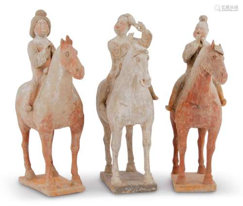 A Group of Three Chinese Painted Pottery Equestrian Figures ...