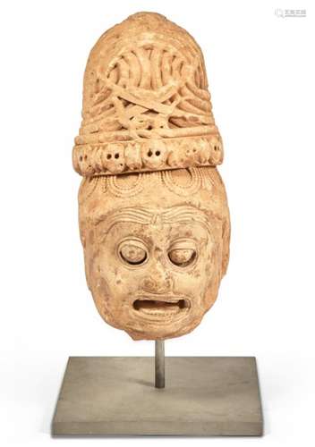 An Indian Carved Stone Head of Chamunda Height 19 