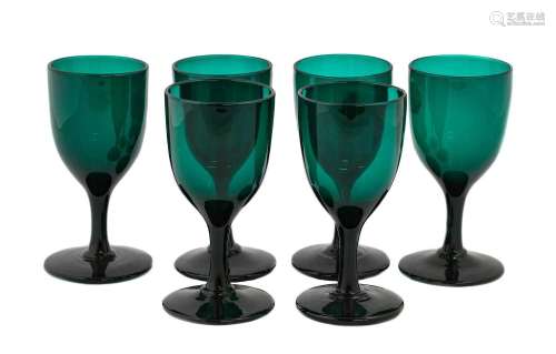 A Set of Six Green Glass Wine Glasses, early 19th century, t...
