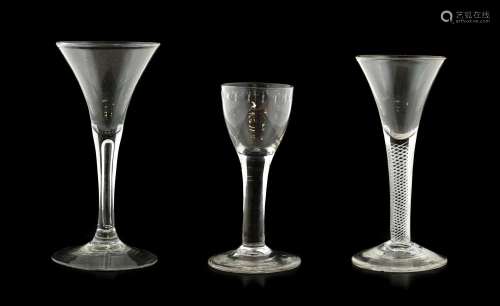 A Wine Glass, circa 1750, the drawn trumpet bowl on an air t...