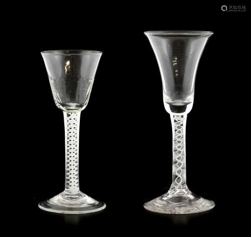 A Wine Glass, circa 1750, the bell-shaped bowl on an opaque ...