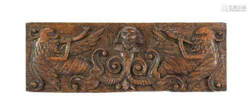 A Relief Carved Wooden Panel, 17th century, centred by the h...
