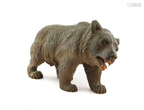 A Black Forest Type Carved Wooden Figure of a Bear, early 20...