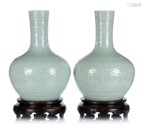 Pair of large celadon vases with lotus decoration in the man...