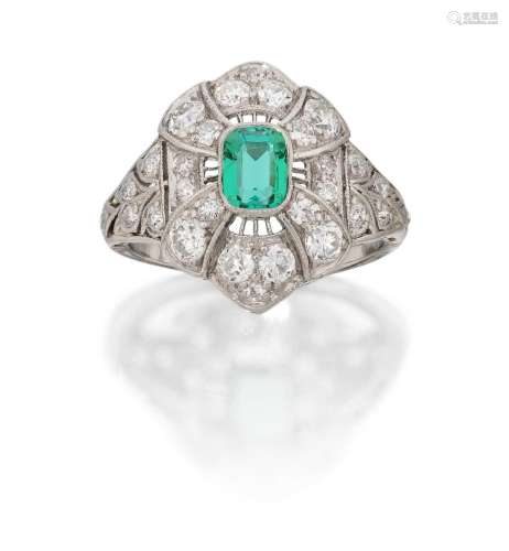 An Emerald and Diamond Ring