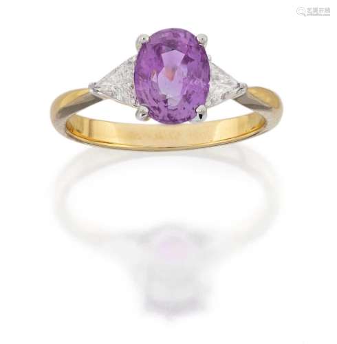 A Pink Sapphire and Diamond Three Stone Ring