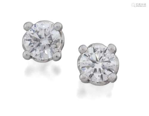 A Pair of 18 Carat White Gold Diamond Solitaire Earrings