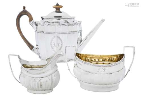 A George III Silver Teapot and An Associated George III Silv...