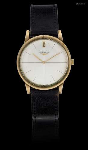 Longines: A 9 Carat Gold Wristwatch signed Longines, 1965