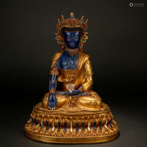A gilt bronze inlaid lapis lazuli seated Buddha statue, Qing...