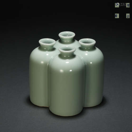 Qing dynasty celadon-glazed flower arrangement in four jars