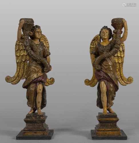 Angeli portacero, coppia di sculture in stucco