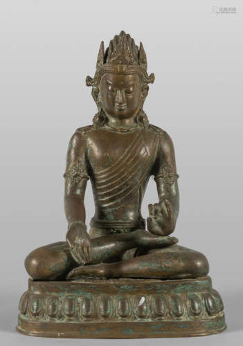 Divinità seduta, scultura in bronzo brunito,