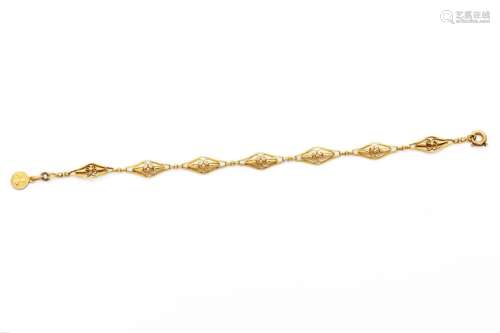 Bracelet en or jaune (750) 18K maille losange filigranée. Mé...