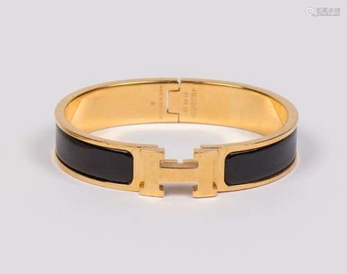 HERMES. Bracelet "Clic H" en émail noir et métal d...