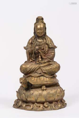 Sujet en bronze doré représentant Bouddha assis sur le dos d...