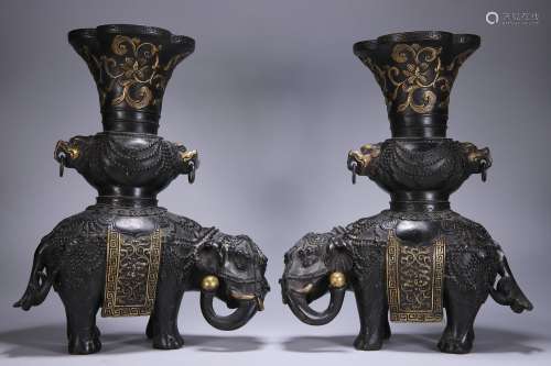A pair of old Tibetan bronze gilt Taiping elephant ornaments