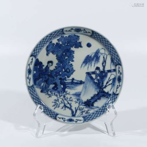 blue and white character plate