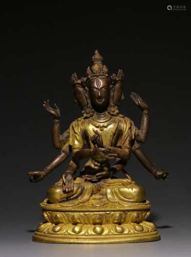 Gilt Bronze Seated Avalokitesvara with Three Faces and Eight...