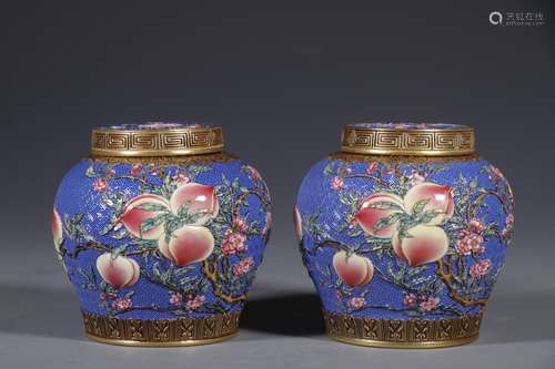 A pair of blue pastel nine peach Fushou tea cans