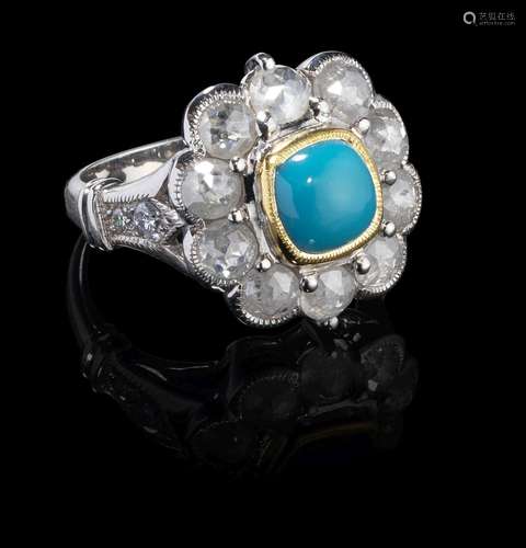 *Bague sertie d'une turquoise taille c