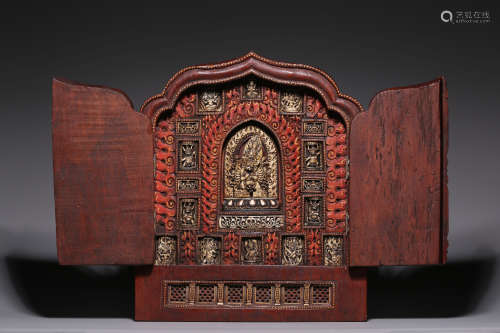 In the Qing Dynasty, red sandalwood inlaid with bone carving...