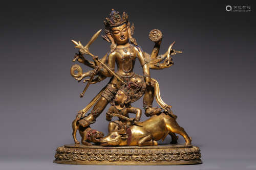 In the Qing Dynasty, a bronze gilt statue of the mother Budd...