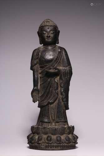 A bronze statue of Sakyamuni standing in the Ming Dynasty