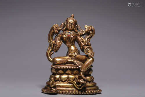 In the Qing Dynasty, a sitting Tara with gilt copper inlaid ...