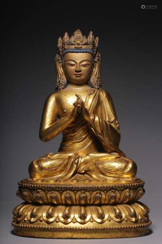 In the Qing Dynasty, a sitting bronze gilt statue of Dari Ta...