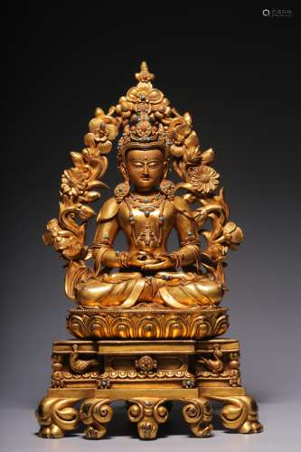 In the Qing Dynasty, a sitting statue of longevity Buddha in...