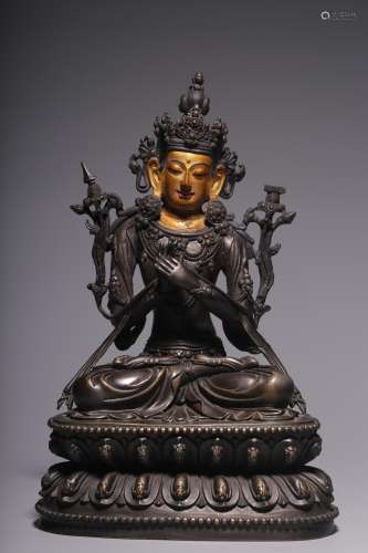 Sitting statue of Manjusri Bodhisattva in bronze and clay in...