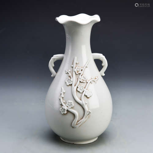 A Blanc-de-chine Vase with Plum Flower Relief