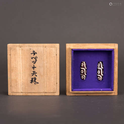 A PAIR OF DZI BEADS WITH JAPANESE BOX
