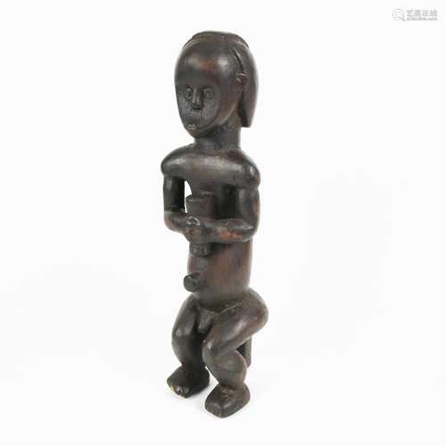 Statuette, dans le style Fang, (Gabon)<br />
Bois à patine b...