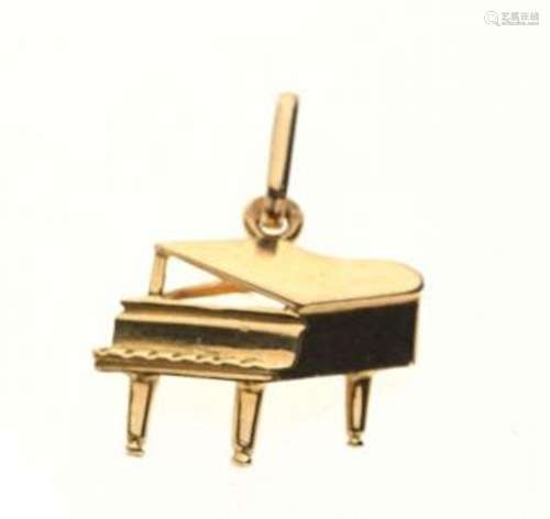 PENDENTIF "Piano" en or jaune 750/°°. 1.2 x 1.1 cm...