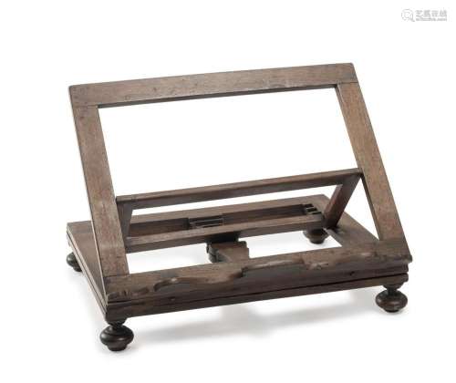 WALNUT-STAINED BOOKREST 19TH CENTURY